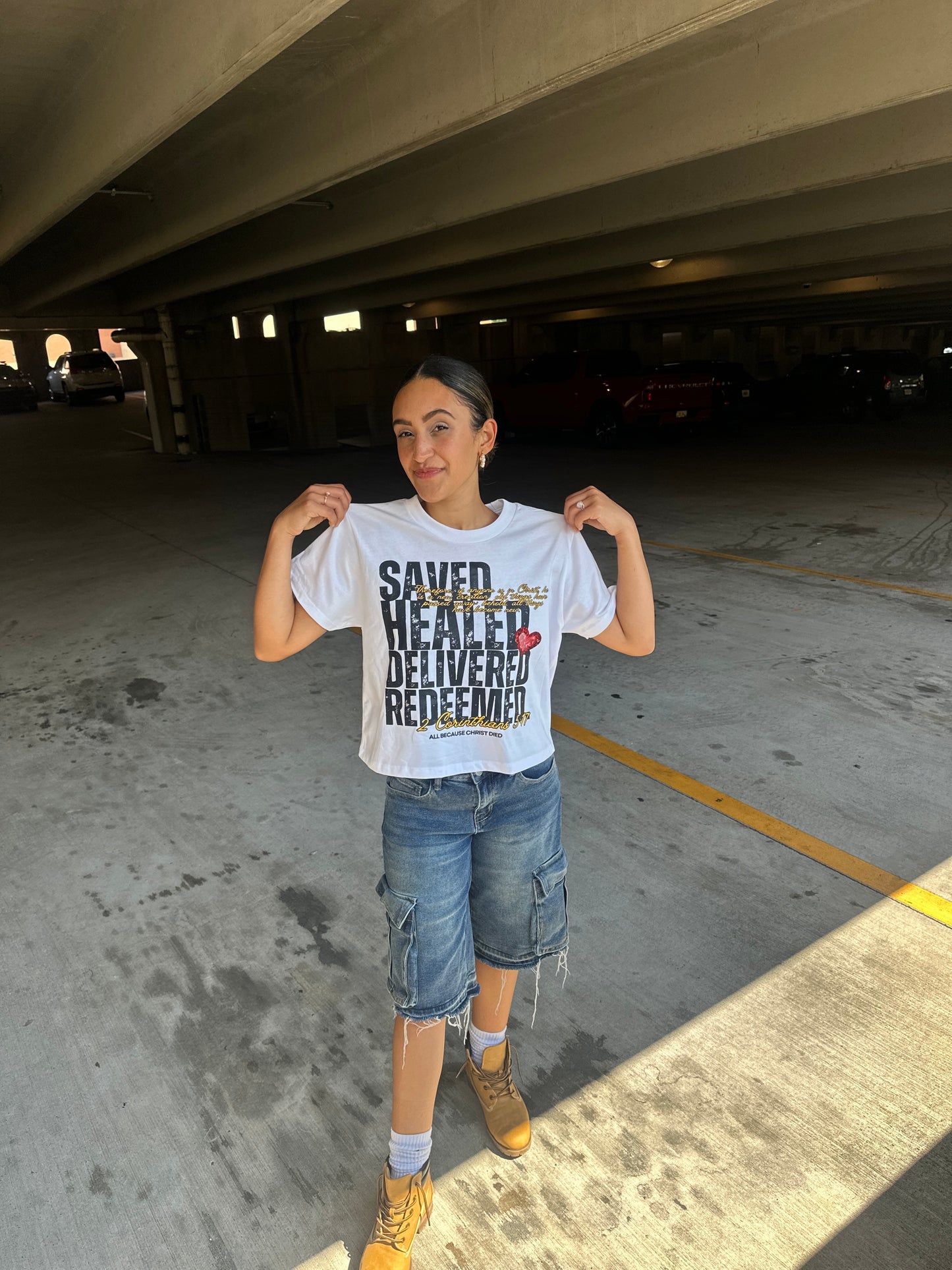 SAVED HEALED DELIVERED REDEEMED CROPPED TEE